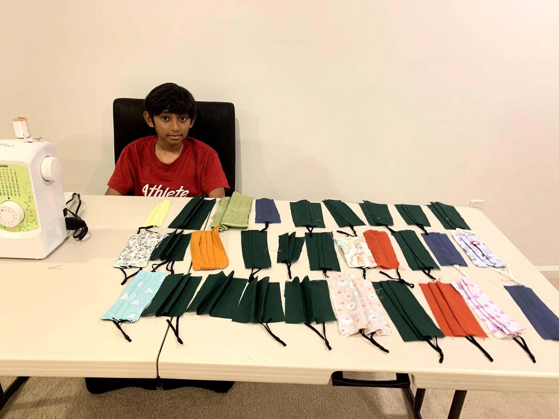 Preparing additional mask pieces at the sewing station