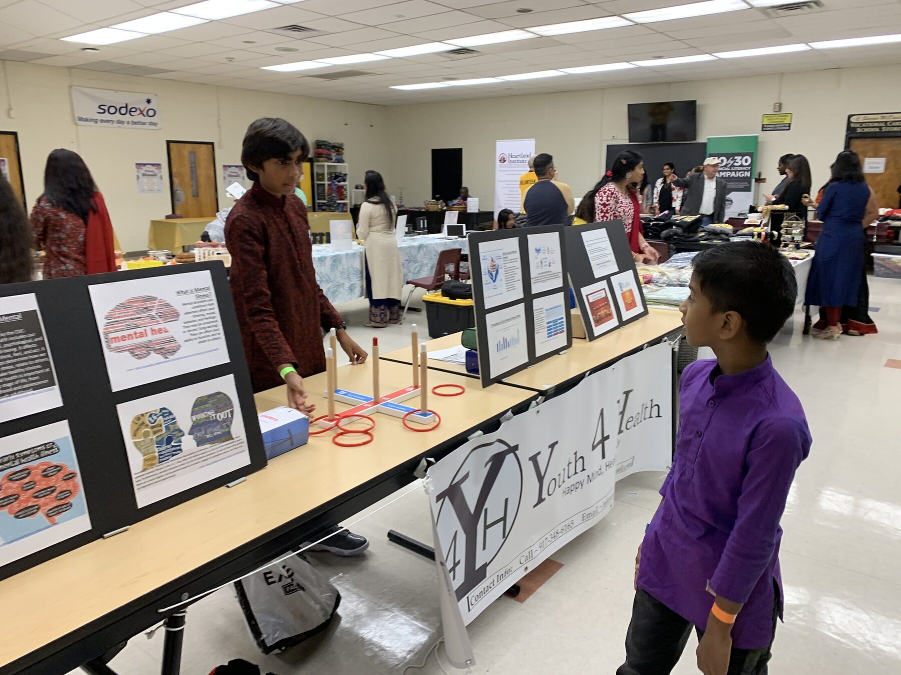 Visitors viewing the mental-health presentation and activities