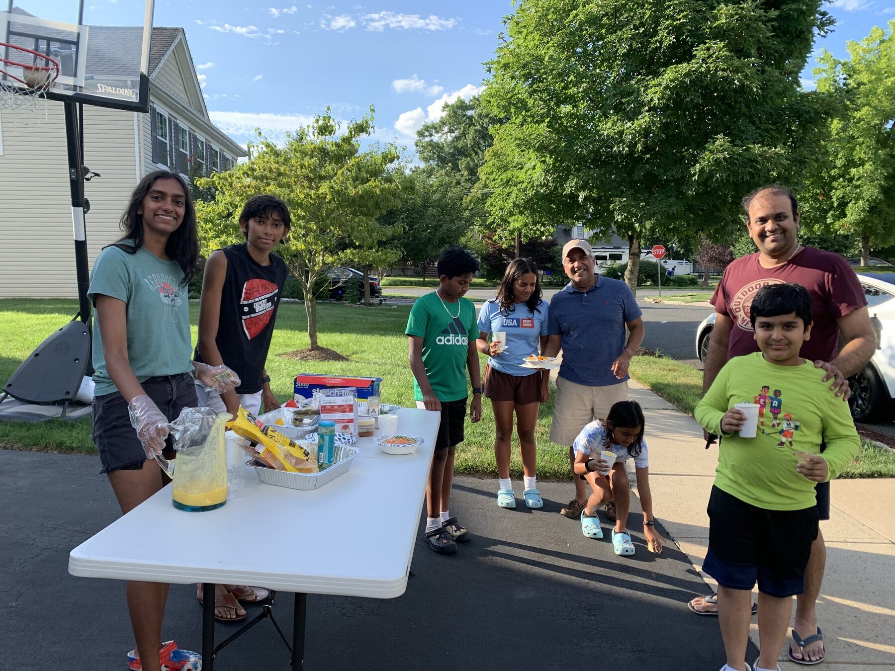 Youth volunteers and supporters at the neighborhood fundraiser