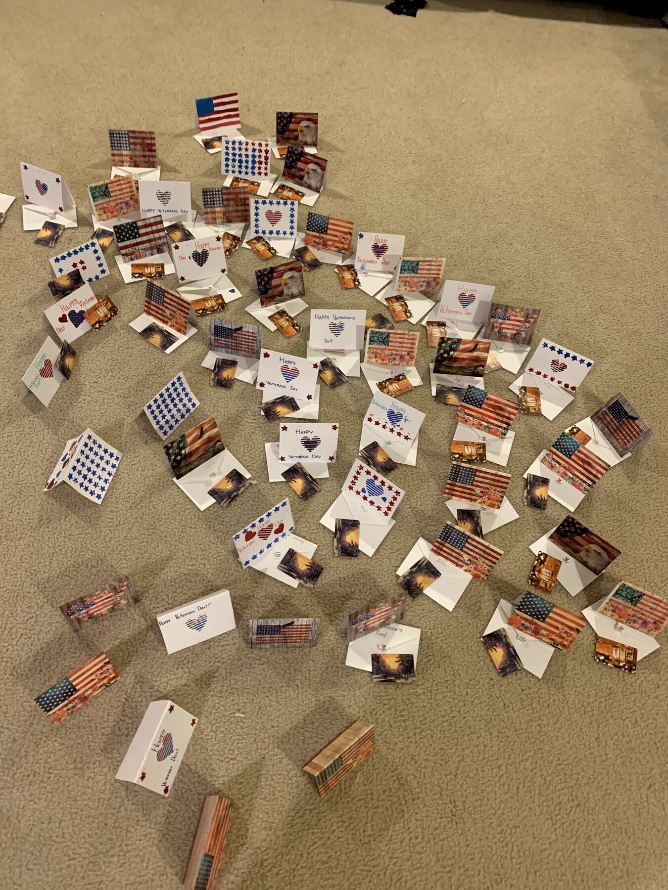 Handmade Veterans Day cards arranged after completion